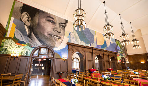 The new mural in the dining hall of Pauli Murray College, which honors its namesake, features a portrait of Murray when she was about the same age as the undergraduates in the residential college, with a long future as a champion of civil and women’s rights still ahead. (Photo by Allie Barton)